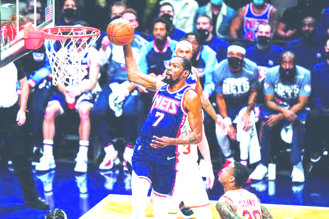durant Brooklyn Nets’ Kevin Durant (7) drives past Atlanta Hawks’ John Collins (20) in the first half of their NBA basketball game on Nov. 3, 2021, in New York. AP PHOTO/FRANK FRANKLIN II