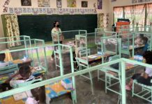 Plastic barriers are installed in between seats of learners of the Laserna Integrated School in Nabas, Aklan to ensure safe physical distancing. A total of 224 learners from Kindergarten to Grade III are joining limited face-to-face classes that started on Nov. 15, 2021. CONTRIBUTED PHOTO, PNA