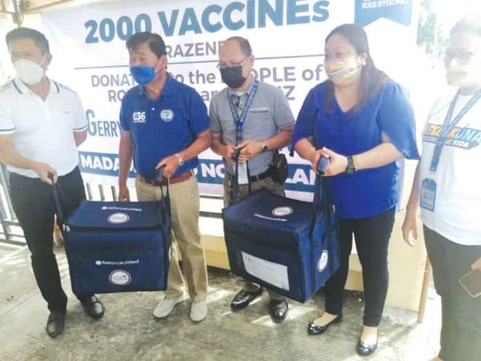 Some 2,000 doses of AstraZeneca vaccines against coronavirus disease 2019 have been delivered to Roxas City and Capiz province. These are donations from former senator and Interior secretary Mar Roxas and the Gerry Roxas Foundation. In photo are Vice Gov. James Magbanua, Roxas City administrator Ronald Amigo, Capiz 1st District’s Cong. Emmanuel Billones, Provincial Board member Thea Faith Reyes, and a representative from City Health Office. PHOTO BY MERLINDA BAGNATE