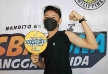 A teenager proudly shows his vaccinated arm. The city government of Roxas started pediatric vaccination against coronavirus disease 2019 on Nov. 10, 2021.