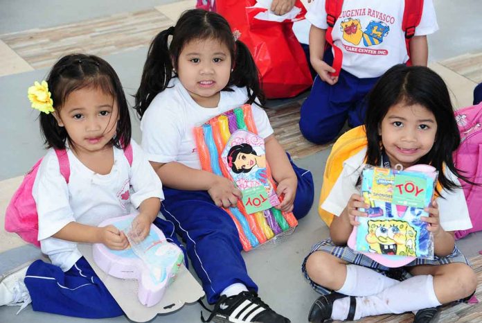 share-a-toy-sm Little girls from Eugenia Ravasco Day Care Center in Paranaque City were some of the recipients during the Share A Toy campaign.