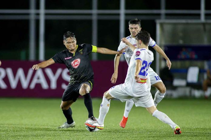 sports-kaya-pic Ilonggo Jovin Bedic of Kaya Futbol Club-Iloilo battles Azkals Development Team’s Oskari Kekkonen during the 2021 Copa Paulino Alcantara finals on Friday night, Nov. 19, 2021. PFL PHOTO