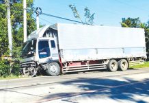 One of the trucks hit by a sport utility vehicle in Barangay Dawis, New Lucena, Iloilo on Monday. PANAY NEWS PHOTO
