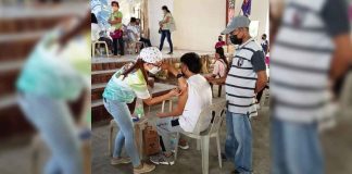 A youngster gets his first dose of the vaccine against coronavirus disease at the Dr. Catalino Gallego Nava Memorial High School in Barangay Constancia, San Lorenzo, Guimaras. PHOTOS FROM GUIMARAS PROV’L GOV’T
