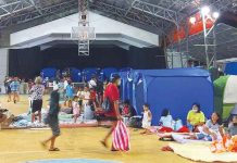 ‘Odette’ displaces 13K Aklan families In the municipality of Balete, Aklan residents in high-risk areas sought shelter at the town’s covered gym when super typhoon “Odette” struck. PHOTO BY PATRICK LACHICA