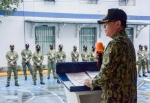 Batiles as full-fledged city police director pushed Police Colonel Leo Batiles, acting director of the Iloilo City Police Office, addresses policemen at the city’s police headquarters. ICPO PHOTO