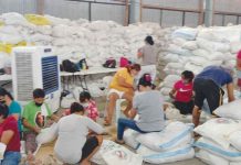 Poor, PWDs, elderly get gift packs from city gov’t Sacks of rice are being repacked for distribution to identified beneficiaries – indigent families, senior citizens and persons with disabilities – of the Iloilo City government's yearly gift-giving. MAYOR JERRY TREÑAS FB PAGE