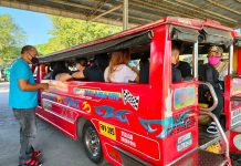 ‘Fuel subsidy for jeepney drivers, not for operators’ A jeepney driver collects fare from passengers at the transport terminal in Barangay Ungka, Jaro, Iloilo City. PANAY NEWS
