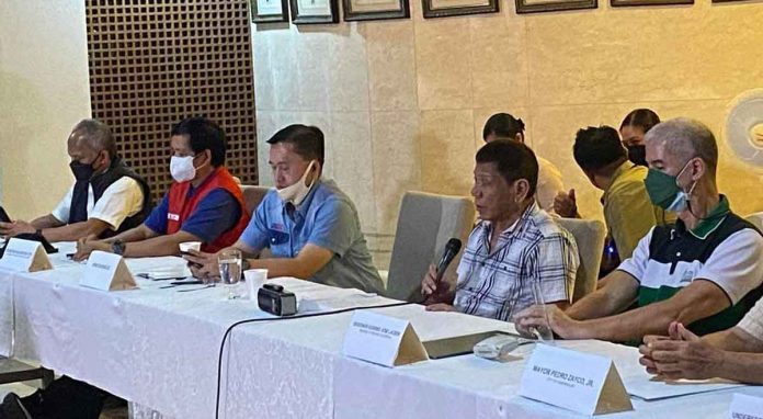 slow During his meeting with Negros Occidental officials on Dec. 20, 2021 in Kabankalan City, President Rodrigo Duterte (second from right) vowed to raise an additional P10 billion for recovery and rehabilitation efforts in Negros that was hit by super typhoon “Odette” on Dec. 16. Also in photo are Gov. Eugenio Jose Lacson and Sen. Bong Go.