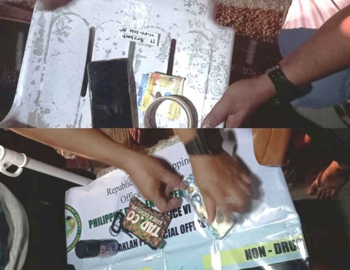 These are the items that policemen say they seized during an antidrug buy-bust operation in Kalibo, Aklan on Jan, 4, 2022.