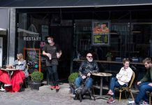 New version of Omicron spreading rapidly in parts of Asia, Europe Photo shows people outside of a cafe in Roskilde, Denmark on April 21, 2021. Claus Bech/Ritzau Scanpix/via REUTERS