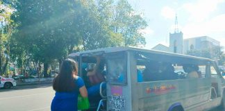 A woman boards a passenger jeepney in Jaro, Iloilo City. To ensure physical distancing, jeepneys here may only accommodate passengers to a maximum of 70 percent of their seating capacity. PN PHOTO