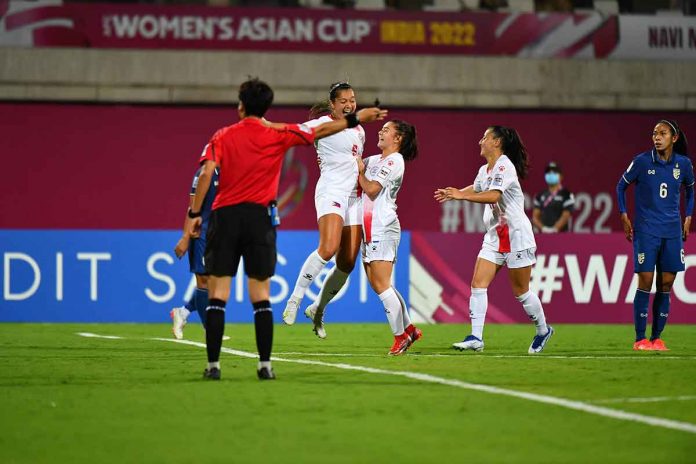 sports-malditas Philippine Malditas’ Chandler McDaniels celebrates with her teammates following their 1-0 win against Thailand. AFC PHOTO