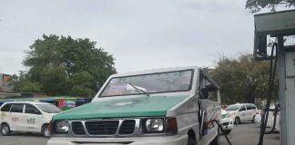 Jeepney drivers in Iloilo City are calling for a fuel price rollback and the suspension of the excise tax on fuel, or for an increase in the minimum fare so they could cope with the continuing rise in the prices of fuel. Photo shows a passenger jeepney refueling in Jaro district. PN PHOTO