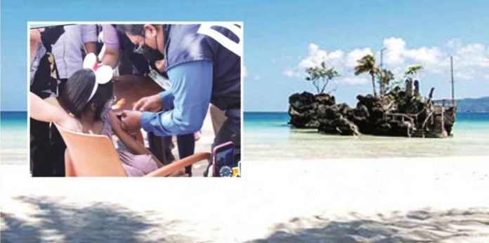 front-pic Boracay Island has long prepared to welcome foreign tourists back. Photo shows the island’s most photographed feature – Willy’s Rock. Inset photo shows a young girl in Boracay receiving a shot of COVID-19 vaccine from Regional Director Adriano Suba-an of the Department of Health Region 6. Pediatric vaccination against the viral disease was launched in the island on Friday. PHOTO BY MALAY MUNICIPAL TOURISM OFFICE