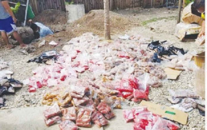 news-asf These intercepted pork-based products from Luzon were brought to the animal quarantine checkpoint in Caticlan, Aklan on Jan. 31, 2022 for proper disposal. Dr. Jonic Natividad, chief of the regulatory division of the Department of Agriculture in Western Visayas, said some online sellers peddle pork from areas hit by the African swine fever. PNA PHOTO
