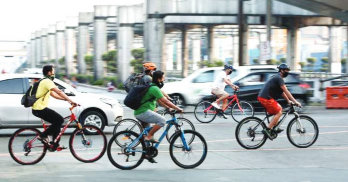 bike-commuter The government has encouraged commuters to consider using bicycles to work to save on fuel costs. MIGUEL DE GUZMAN