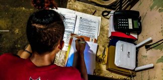 LEARNING KNOWS NO BOUNDARIES. A high school student answers his learning modules at home in Iloilo province. His school is not among those allowed to hold limited face-to-face classes. School Year 2021-2022 officially started on Aug. 5, 2021 and would end on June 24, 2022. The Department of Education will be allowing limited face-to-face graduation, too. PN PHOTO
