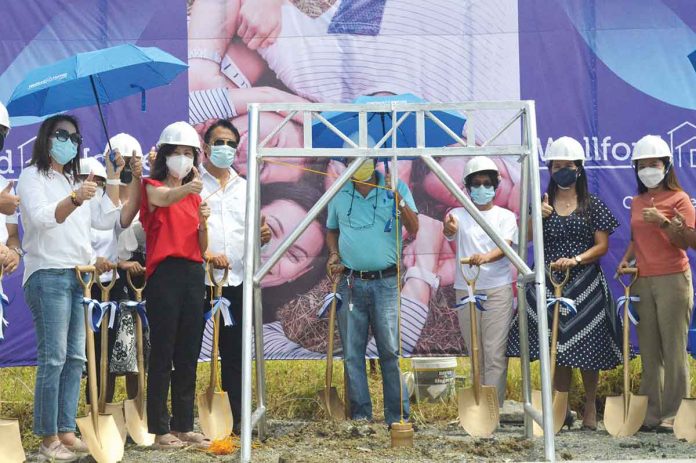 Groundbreaking ceremony along with Ms. Elvira A. Ting, president and Iloilo brokers.