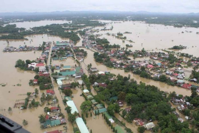 FLOODED TOWN. This is the flooded town of Sigma in Capiz province three days after Tropical Depression “Agaton” pounded it with torrential rains. The Office of Civil Defense – Western Visayas conducted an aerial inspection with the help of the Philippine Air Force. PHOTO BY OCD – REGION 6