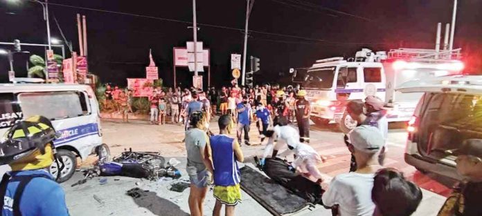 front-dom-talisay NIGHT ACCIDENT. Medics respond to a vehicular accident in Talisay City, Negros Occidental involving a speeding ambulance and a motorcycle. The motorcycle driver died. TALISAY CITY DRRMO PHOTO