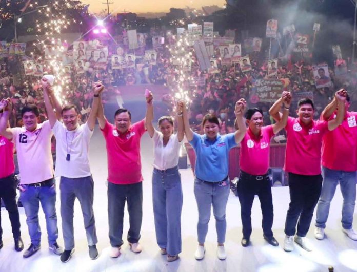 Iloilo City’s Cong. Julienne Baronda, Mayor Jerry Treñas and Vice Mayor Jeffrey Ganzon, seen here with their Uswag Ilonggo nominees during their proclamation rally, are poised to win the polls two weeks from now. The newest RACI survey shows their supremacy over their challengers.
