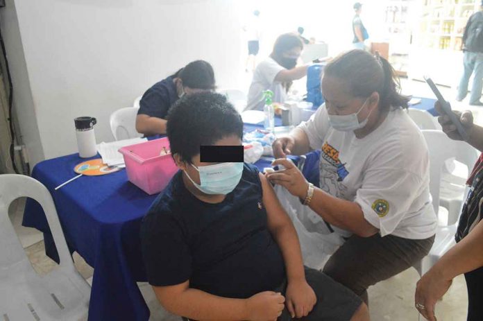 news-ime-booster A youngster gets his dose of the vaccine against coronavirus disease 2019 at the Iloilo provincial capitol. Fearing a possible surge in infections after the elections, the provincial government is stepping up its vaccination drive. PN PHOTO