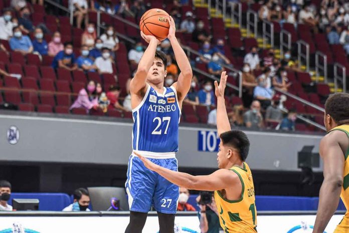 sports-ateneo-pic Bacolodnon Samjosef Belangel of Ateneo de Manila University Blue Eagles scores against the defense of Far Eastern University Tamaraws’ Ljay Gonzales. UAAP MEDIA BUREAU