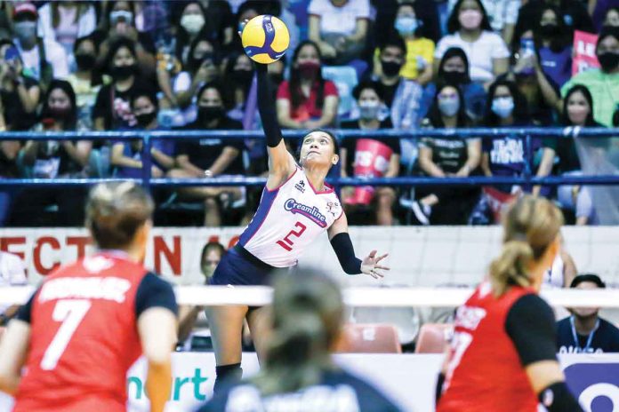sports-cool Creamline Cool Smashers’ Alyssa Valdez scores on an attack point against Petro Gazz Angels in Game 2 of the 2022 PVL Open Conference finals. PVL MEDIA BUREAU