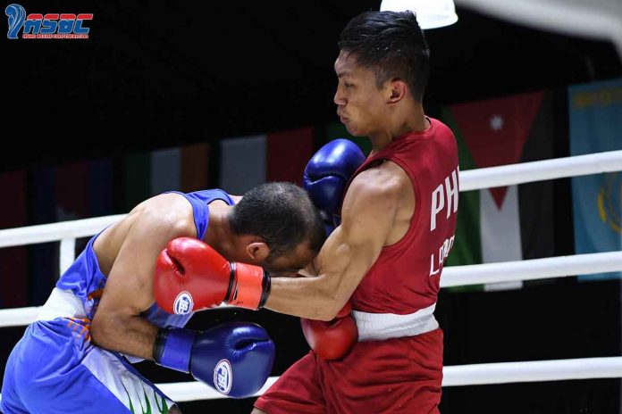 sports-negrense-pic Negrense Rogen Ladon connects with a left uppercut to Amit Panghal of India during their men's flyweight gold medal bout in the 2022 Thailand Open International Boxing Tournament at the Angsana Laguna Phuket Resort Hotel. ABAP PHOTO