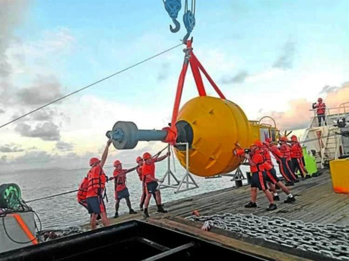 buoy Philippine Coast Guard personnel maneuver a navigational buoy from their ship into the water — one of five they installed near their detachments at Spratly Islands in the West Philippine Sea from May 10 to May 17 to ensure safer navigation for ships and assert the country’s sovereignty in the disputed waters. PHOTO FROM THE PHILIPPINE COAST GUARD