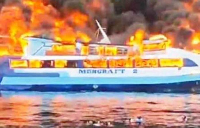 fastcraft-fire A passenger boat catches fire off the coast of Quezon province on Monday morning. PHOTO FROM THE PHILIPPINE COAST GUARD FACEBOOK via VINCENT BARDOG CACERES