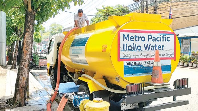 From this injection point of Metro Iloilo Water District in La Paz, Iloilo City, a tanker of Metro Pacific Iloilo Water gets water for delivery to other parts of Iloilo City. The goal is to ensure that the city has enough water. PN PHOTO