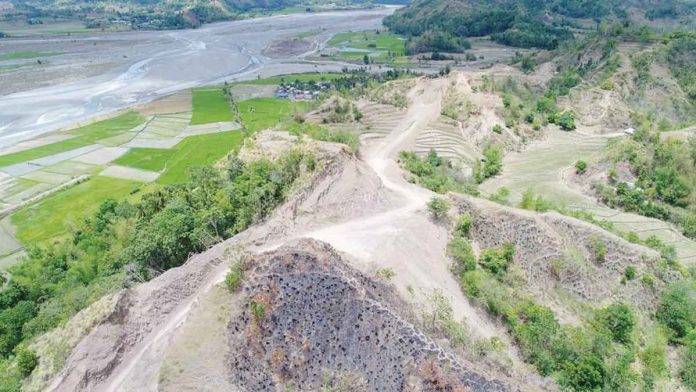 mark Aside from cutting down travel time, the Panay East-West Lateral Road is designed to boost tourism and improve agricultural productivity in certain communities. DPWH PHOTO
