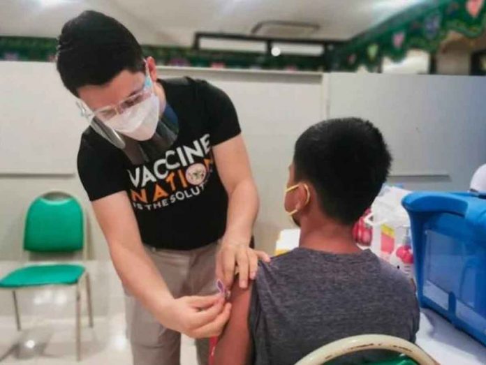 nation1 A boy gets his first COVID-19 vaccination at the Cotabato Regional and Medical Center. PHOTO FROM THE FACEBOOK ACCOUNT OF THE DEPARTMENT OF HEALTH
