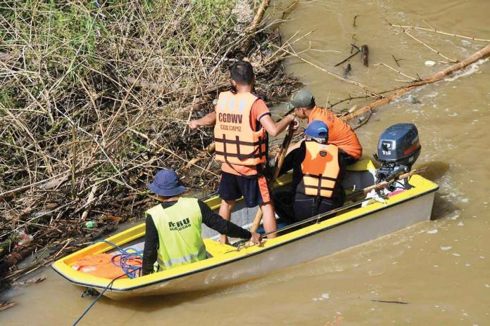 region-glenda-found This is one of the search teams looking for a missing ice cream vendor in Mambusao, Iloilo. PHOTO BY CAPIZ PDRRMO