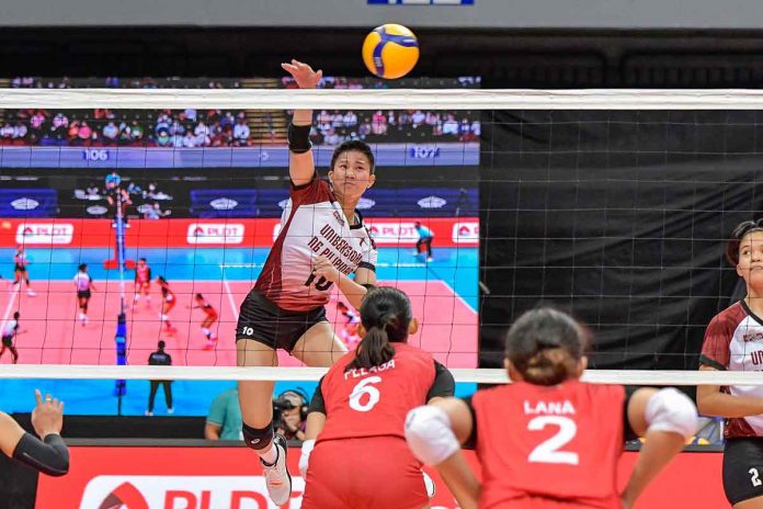 sports-UP-pic Negrense Alyssa Bertolano of the University of the Philippines Fighting Maroons unloads a powerful hit against University of the East Lady Warriors. UAAP MEDIA BUREAU