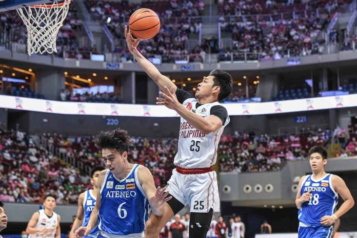 sports-UP-pic University of the Philippines Fighting Maroons’ Ricci Rivero loses control of the ball as he goes for a layup. UAAP MEDIA BUREAU