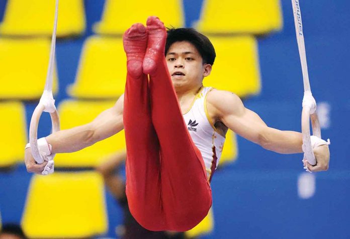 sports-yulo Filipino gymnast Carlos Edriel Yulo performs during his 31st Southeast Asian Games event on Friday. REUTERS
