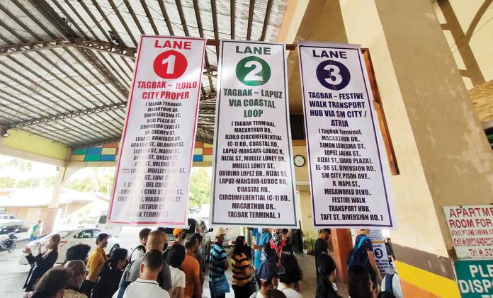 At the transport terminal in Barangay Tagbak, Jaro, Iloilo City, these three tarpaulins give directions to people which city-bound jeepneys to board. ARNEL JOHN PALCULLO/PN