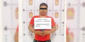 Pawnshop security guard Mark Archie Torrefiel faces a robbery with homicide charge for the death of his pawnshop manager in Kalibo, Aklan. PHOTO JURIS BAUTISTA SUCRO