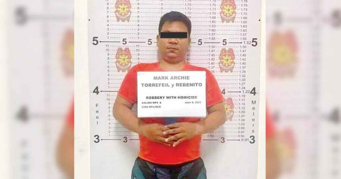 Pawnshop security guard Mark Archie Torrefiel faces a robbery with homicide charge for the death of his pawnshop manager in Kalibo, Aklan. PHOTO JURIS BAUTISTA SUCRO