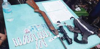 These guns and bullets were recovered from a house that policemen raided in Numancia, Aklan on June 20. They were unlicensed. PHOTO BY RODNEL AGUIRRE, RMN DYKR KALIBO
