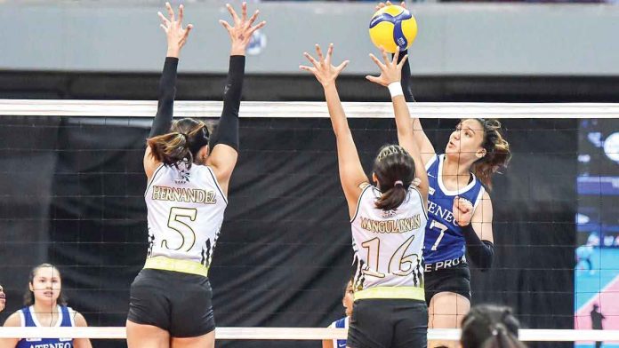 sports-ateneo Faith Nisperos and the Blue Eagles deal the Tigresses their first straight-sets loss in the tournament. UAAP PHOTO