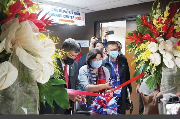 biz-OFW The One Repatriation Command Center of the Department of Migrant Workers (DMW) has been formally opened. From left: Department of Foreign Affairs undersecretary Eduardo Jose De Vega, DMW secretary Susan “Toots” Ople and Overseas Workers Welfare Administration’s Administrator Hans Leo Cacdac.
