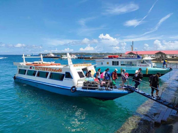 People from Boracay Island disembark from a boat at the jetty port in Caticlan, Malay, Aklan. The port is the main gateway to Boracay.