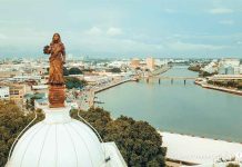 Iloilo City gets ‘day off’ for 89th charter anniversary Iloilo City as seen from atop the city hall featuring the “Lin-ay sang Iloilo” bronze statue and the Iloilo River below. CITY MAYOR’S OFFICE PHOTO