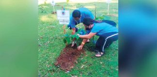 SAVING THE ENVIRONMENT. Iloilo’s Gov. Arthur Defensor Jr. and Mitzi Peñaflorida, senior environmental management specialist of the Iloilo Provincial Government Environment and Natural Resources Office, plant a tree seedling at the Maasin Watershed in Maasin, Iloilo during the “Tanum Iloilo sa Hunyo 2022”, a reforestation activity of the Iloilo provincial government to improve Iloilo’s forest cover. ILOILO PENRO PHOTO