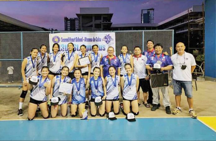 sports-bacolod Bacolod Tay Tung High School Thunderbolts captures the 18-Under title in the 13th St. Ignatius Volleyball Cup in Cebu City. PHOTO COURTESY OF JOSE MONTALBO