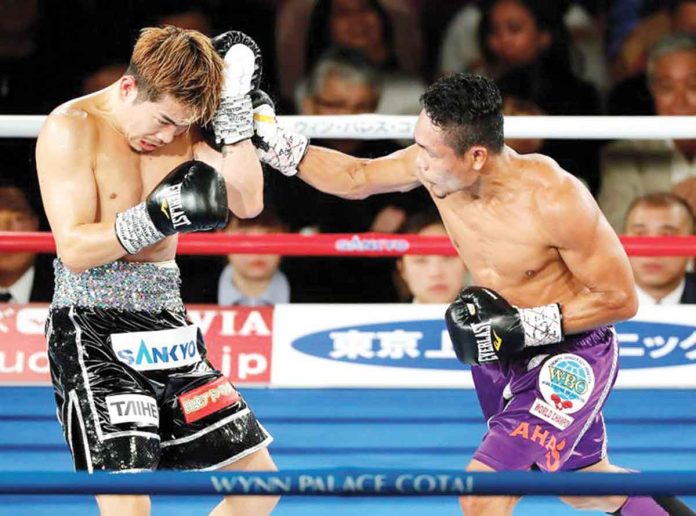 sports-nietes Negrense Donnie Nietes lands a punch against Japanese Kazuto Ioka during their first encounter on Dec. 31, 2018. GETTY IMAGES